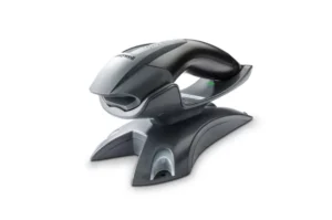 Honeywell Voyager 1202g scanner docked in its vertical charging and communication base - side view
